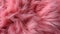 Vibrant distant view of soft bright pink fur texture for background designs or print materials