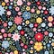 Vibrant ditsy floral seamless pattern with bright summer flowers on dark background.