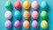 Vibrant Easter eggs arranged festively on tabletop, top view composition