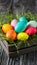 Vibrant Easter Eggs displayed in a charming rustic wooden crate