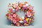 Vibrant Easter wreath made of spring flowers and