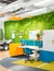 vibrant and energetic openconcept office interior design vibrant wall art and greenery