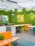 vibrant and energetic openconcept office interior design vibrant wall art and greenery