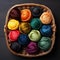 Vibrant and eye-catching yarn balls in a basket, showcasing rich color palettes