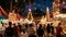 Vibrant fairground scene with diverse unfocused crowd enjoying the festive ambience