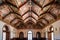 vibrant frescoes adorning a renaissance-style ceiling