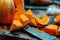 Vibrant Fresh Pumpkin Chunks on a Rustic Wooden Cutting Board with a Sharp Knife