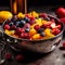 A vibrant fruit salad in a hammered metal bowl