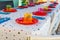 Vibrant gathering with colorful plates around a home table