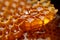 Vibrant golden honey and detailed honeycomb abstract background with warm hues and natural sweetness