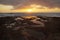 Vibrant, golden sunrise over the limestone coasts of El Medano, Tenerife, Canary Islands, Spain