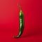 Vibrant Green Jalapeno Pepper On Red Background - Minimal Retouching