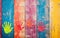 Vibrant Handprints of Childhood on a Wooden Fence