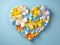A vibrant heart composed of multicolored paper flowers on a soothing blue backdrop
