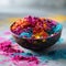 Vibrant Holi colored powders in a bowl signifying celebration