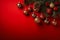 Vibrant Holiday Decor: A Festive Fusion of Red, Pine Cones, and