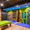 A vibrant and interactive playroom with a climbing wall, a slide, and a dedicated reading nook5, Generative AI