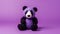 Vibrant Knitted Panda Toy On Purple Background