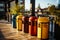A Vibrant Lineup of Colorful Trash Cans on a Rustic Wooden Floor