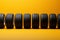 Vibrant lineup Yellow background accentuated by a precise row of tires