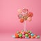 Vibrant lollipops and confections adorn a pretty pink background