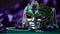 Vibrant mardi gras mask and beads on purple and green gradient background with copy space
