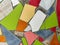 Vibrant Mosaic Artwork Displaying Assemblage of Colored Tiles. Array of brightly colored and textured tiles arranged