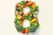 Vibrant number 8 formed by colorful fruits and vegetables