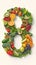 Vibrant number 8 formed by colorful fruits and vegetables