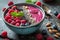 A vibrant and nutrient-packed smoothie bowl adorned with an assortment of superfoods like berries