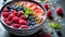 A vibrant and nutrient-packed smoothie bowl adorned with an assortment of superfoods like berries
