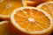 Vibrant orange slices up close, bursting with juicy citrus goodness