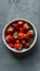 Vibrant Organic Strawberries White Dish on Muted Gray Background