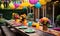 Vibrant outdoor party setting with colorful decorations, paper lanterns, party hats, and a festive table set for a joyful