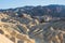 Vibrant panoramic summer view of Zabriskie point badlands in Death Valley National Park, Death Valley, Inyo County, California,