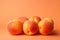 Vibrant Peaches on Orange Background AI Generated