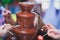 Vibrant Picture of Chocolate Fountain Fontain on childen kids birthday party with a kids playing around and marshmallows and fruit