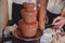 Vibrant Picture of Chocolate Fountain Fontain on a children kids birthday party with a kids playing around and dipping