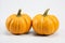 Vibrant pumpkin on clean white backdrop for eye catching ads and captivating packaging designs