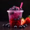 Vibrant purple slushie in a clear plastic cup with fresh berry garnish