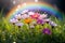 A vibrant rainbow stretching over a green field with spring flowers