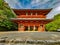 The vibrant red Daimon gate functioning as the entrance to the famous pilgrimage town Koyasan in Wakayama, Kansai, Japan