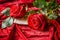 Vibrant Red Roses and Love Letter on Luxurious Silk Fabric Background Romantic Concept for Valentine\\\'s Day,