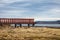 Vibrant red wooden pier at Royston Shoreline Park, Royston BC