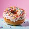 Vibrant Sprinkled Donut In Bold Chromaticity - Stock Image
