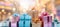 Vibrant stacked gift boxes with blurred bokeh background in retail store window scene