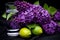 Vibrant still life with blooming lilac brush and assorted fresh fruits arrangement
