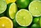 A vibrant still life of a large variety of lush green and sun-drenched yellow limes