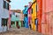 Vibrant street with laundry in colorful Burano near Venice, Italy