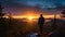 Vibrant sunrise scene with hiker silhouette